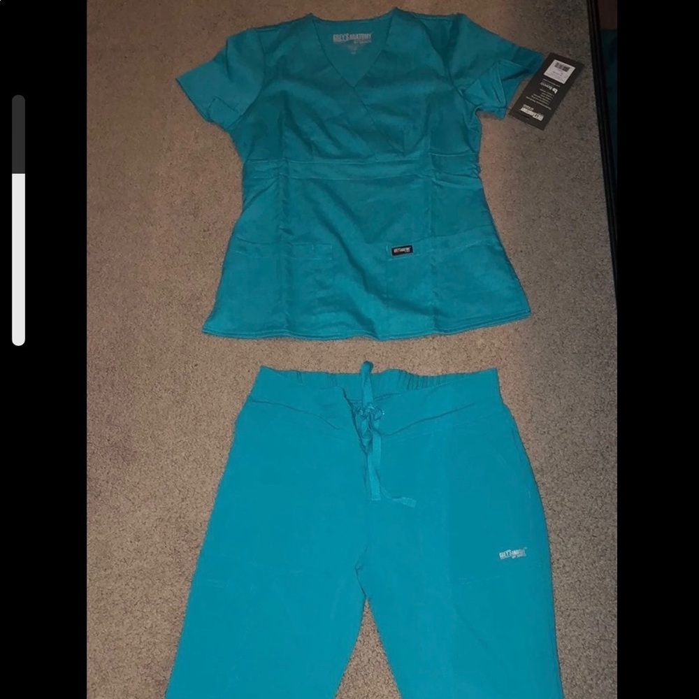 Greys Anatomy set Womens mock size Xs teal color.